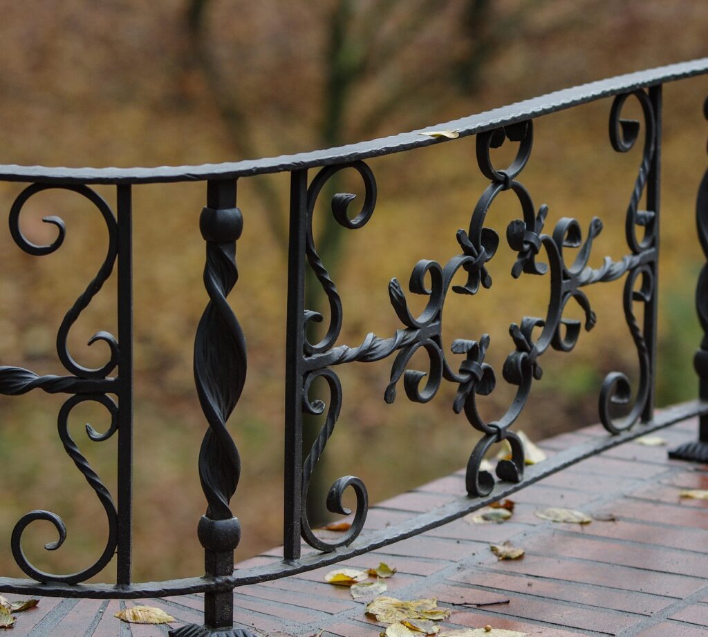 elegant custom wrought iron gate outside